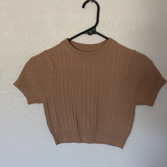 These tops are from fashion Q the black is a small and the tan is extra small. - Picture 5 of 8